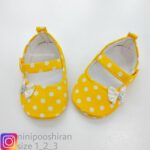 پاپوش نوزادی خالدار زرد